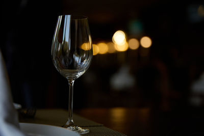 Close-up of wineglass on table