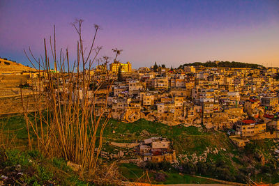 High angle view of townscape against sky at sunset