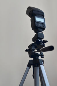 Close-up of camera against white background