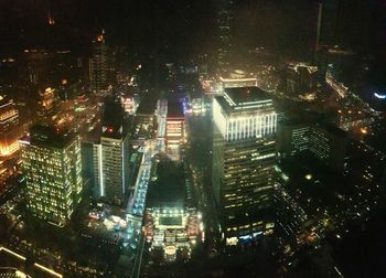 Illuminated cityscape at night
