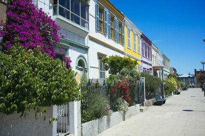 Street amidst buildings against sky