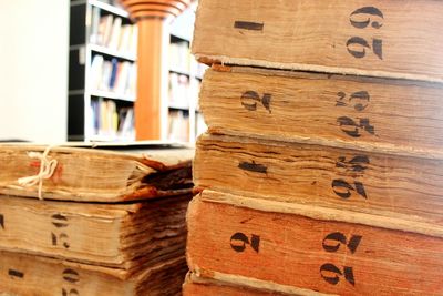 Stack of old books in library