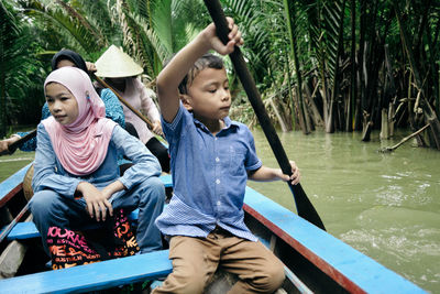 People traveling in boat