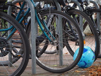 Close-up of bicycle parked in parking lot