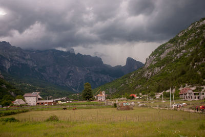 Scenic view of landscape and mountains against sky