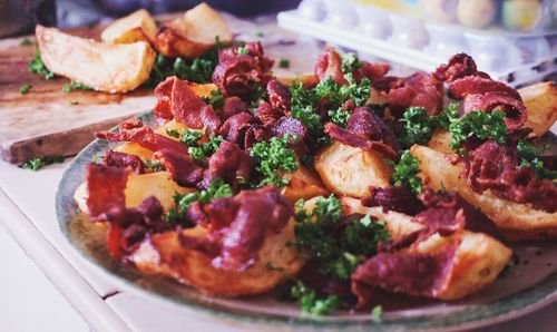 Close-up of pizza served in plate