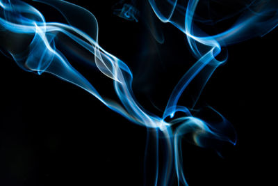 Close-up of smoke against black background