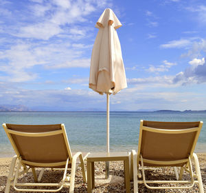 Sun loungers on ipsos beach in corfu