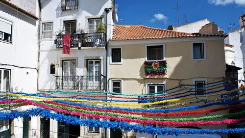 Low angle view of multi colored buildings in city