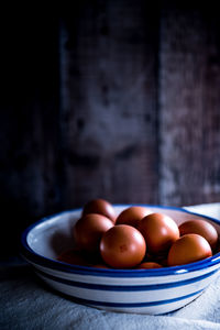 Close-up of eggs in bowl on table