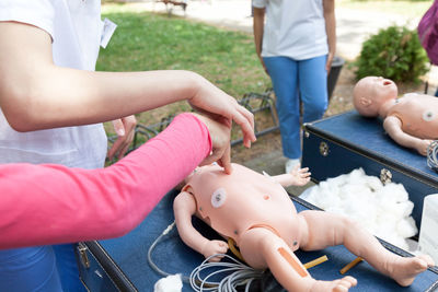 High angle view of people with toy