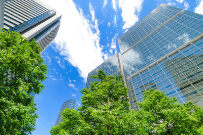 Low angle view of modern buildings against sky