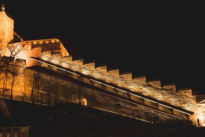 Low angle view of steps at night