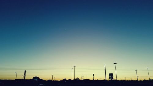 Low angle view of street light against clear sky