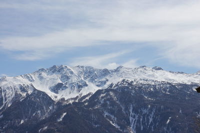 Idyllic shot of snowcapped mountains against sky