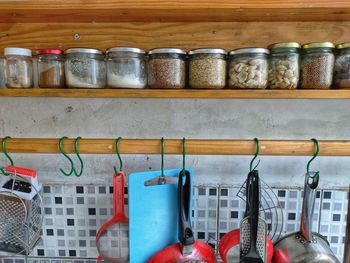 Close-up of various bottles on shelf