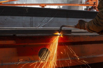 Cropped image of man working in factory