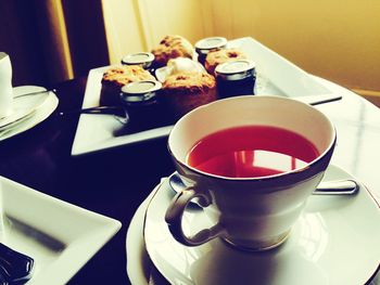 Close-up of coffee cup on table