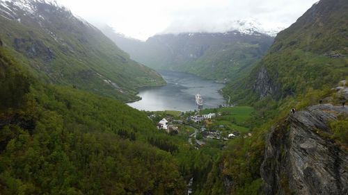 Scenic view of landscape and mountains against sky