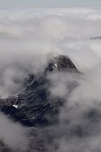 Scenic view of cloud covered alps