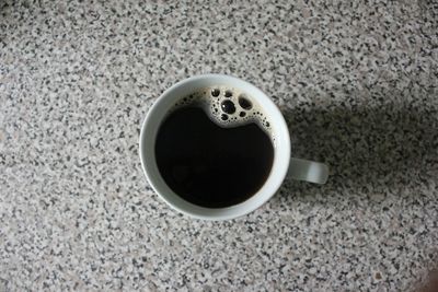 Close-up of coffee cup on table