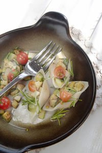 High angle view of salad in plate on table