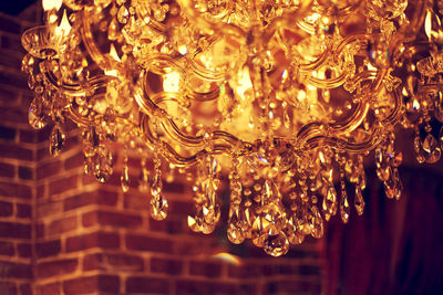 Close-up of chandelier hanging on ceiling