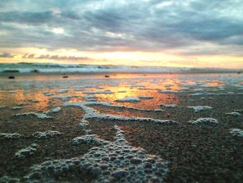 Scenic view of sea against sky at sunset