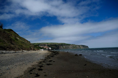 Scenic view of beach against sky