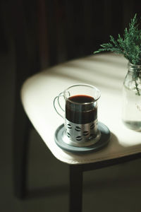 Close-up of electric lamp on table