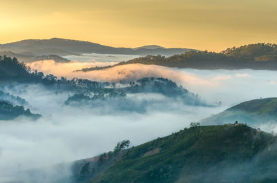 Panoramic view of mountains against sky during sunset