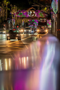 Blurred motion of light trails on road at night