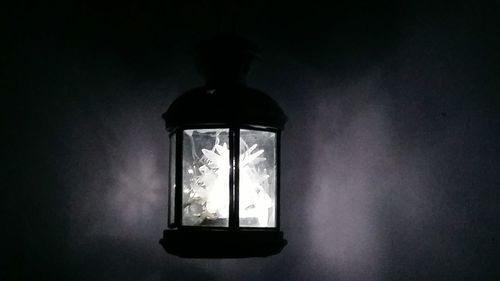 Illuminated lamp in dark room