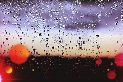 Close-up of water drops on glass