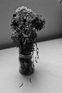 Close-up of flower vase on table