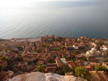 High angle view of houses against sea