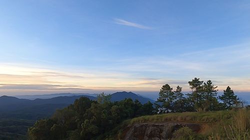 Scenic view of mountains against sky during sunset