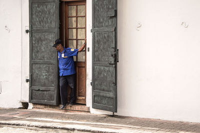 Security guard standing at entrance