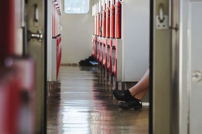 Low section of man in corridor