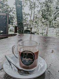 Close-up of coffee cup on table