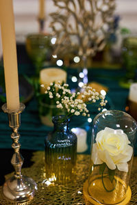 Romantic dinner table setting with festive lights