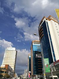 Low angle view of modern buildings against sky