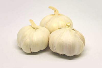 Close-up of pumpkins against white background