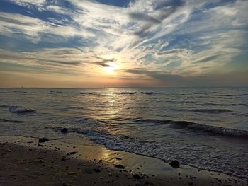 Scenic view of sea against sky during sunset