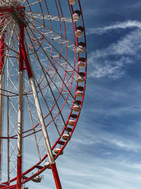 Low angle view of ferris wheel against sky