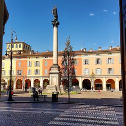 Facade of building against blue sky