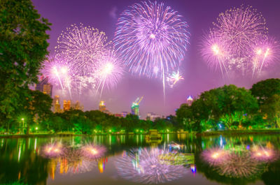 Reflection of sky illumed with fire crackers