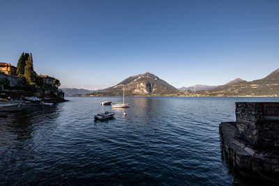 Scenic view of sea against clear blue sky