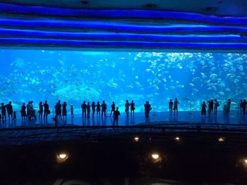 Night view of illuminated people at night