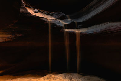 Low angle view of illuminated cave